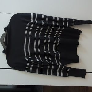 Black sweater with white stripes